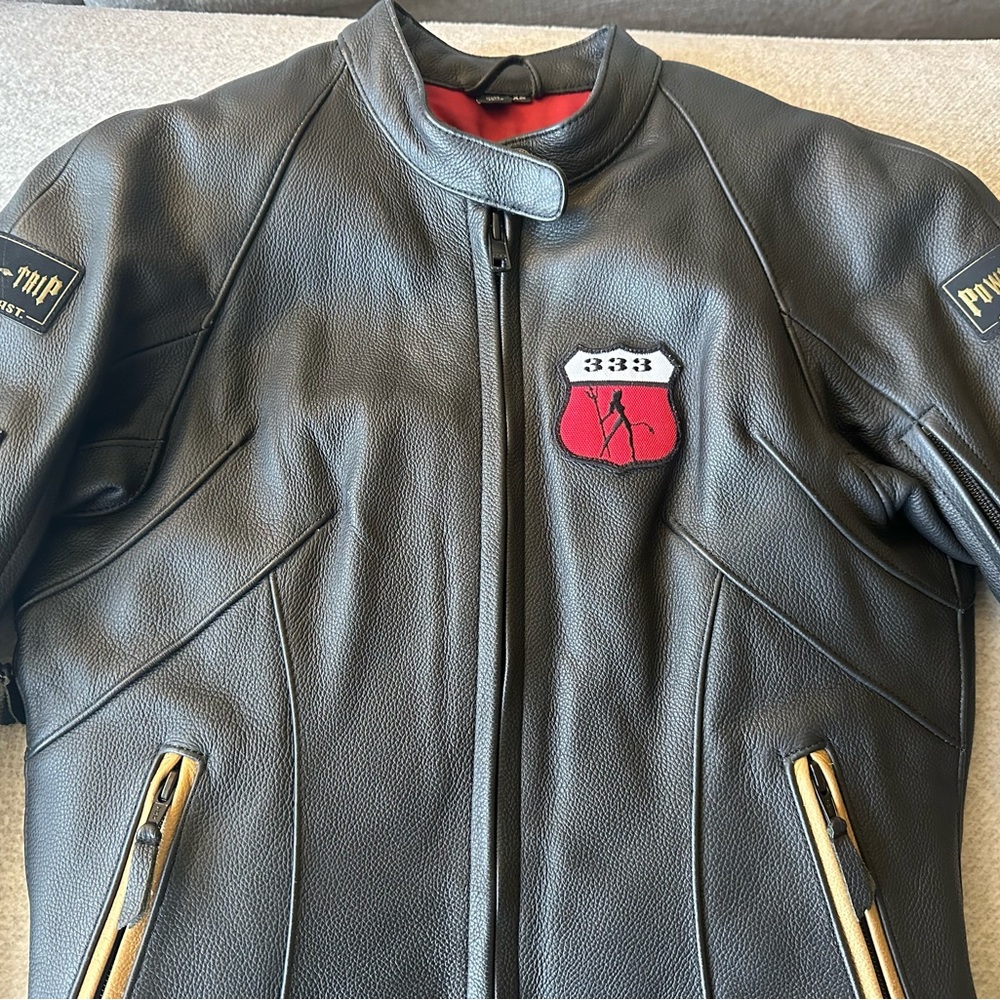 Women’s gently used, Black Widow Powertrip motorcycle jacket.